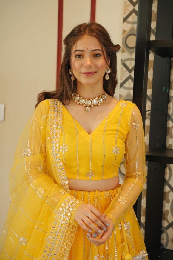 Aisha yellow net lehenga choli set - Image 8
